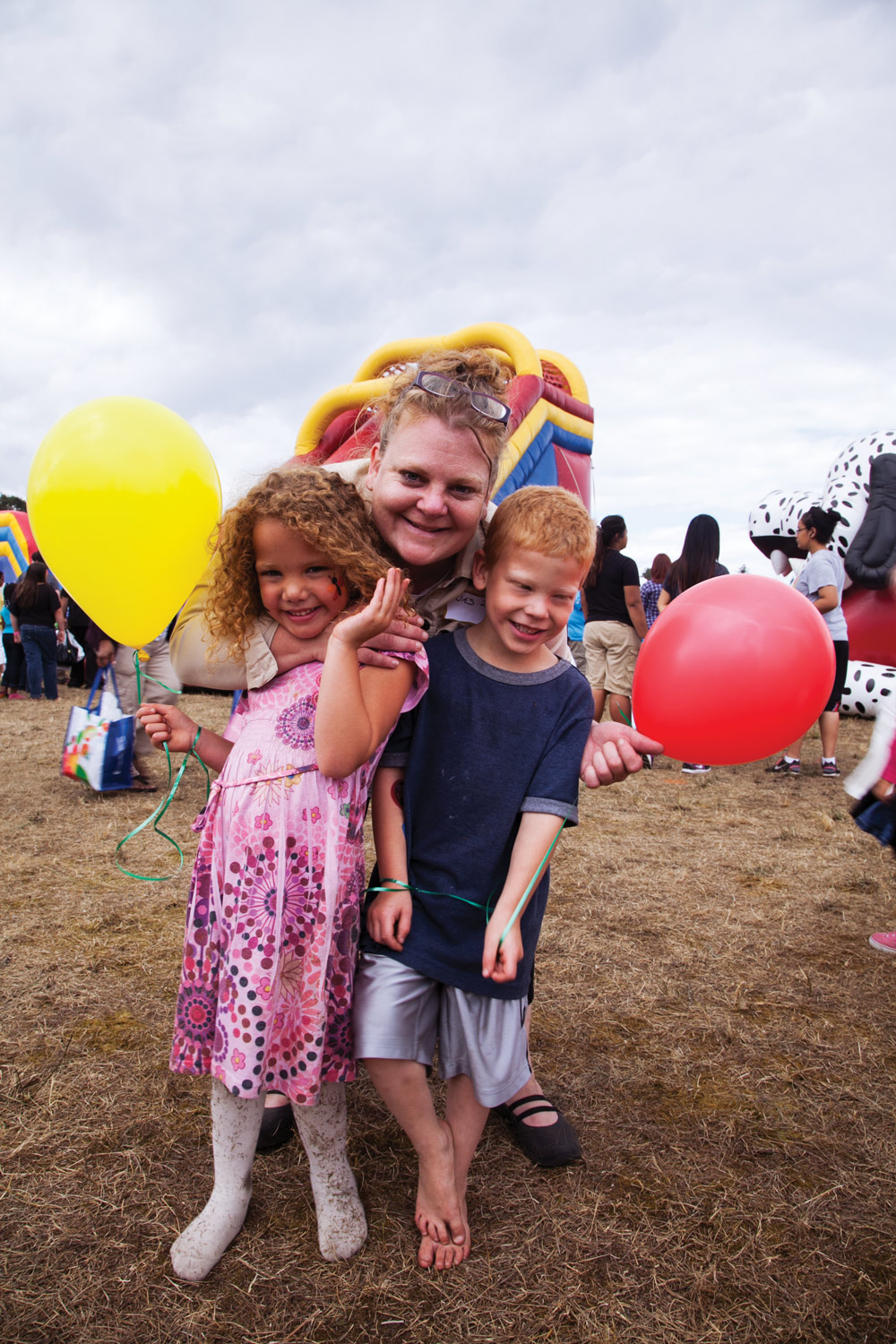Monet, Julie and Hezzy (L to R) enjoyed inflatables, face-painting and family fun in the kids zone.